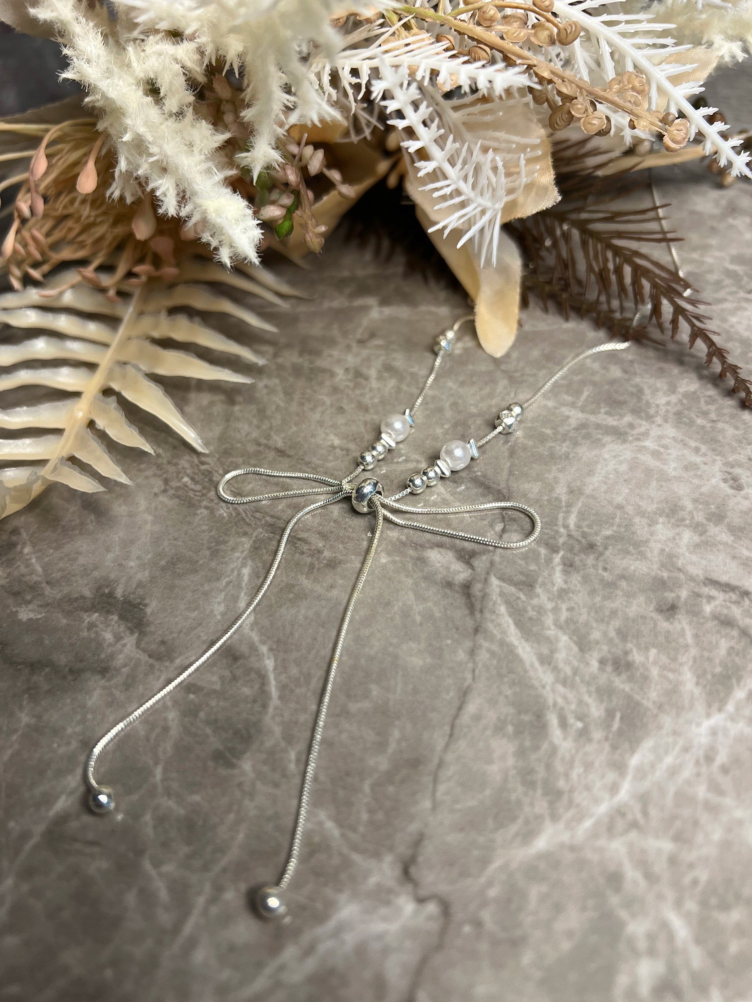 パールリボン結びチョーカー