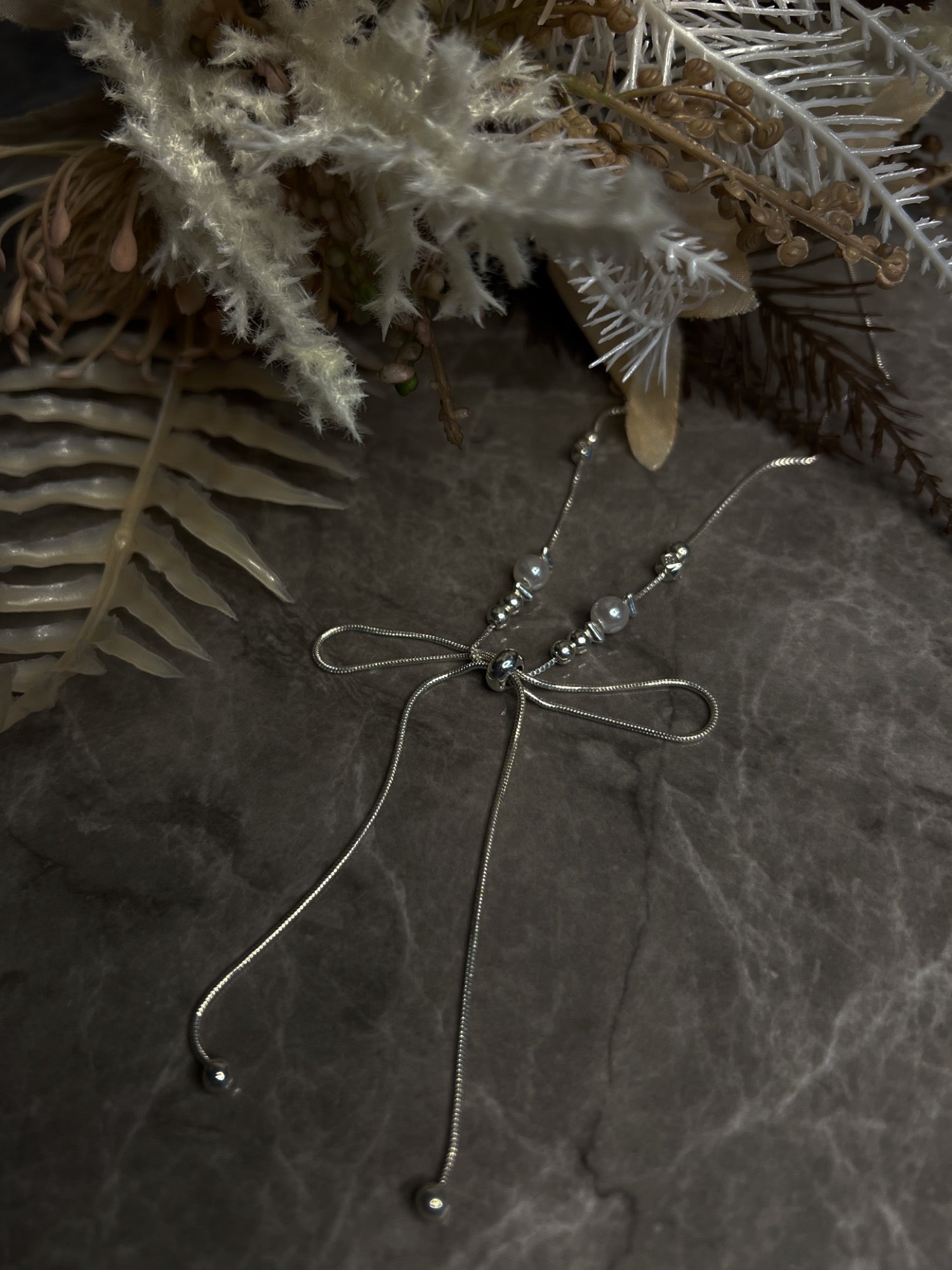 パールリボン結びチョーカー